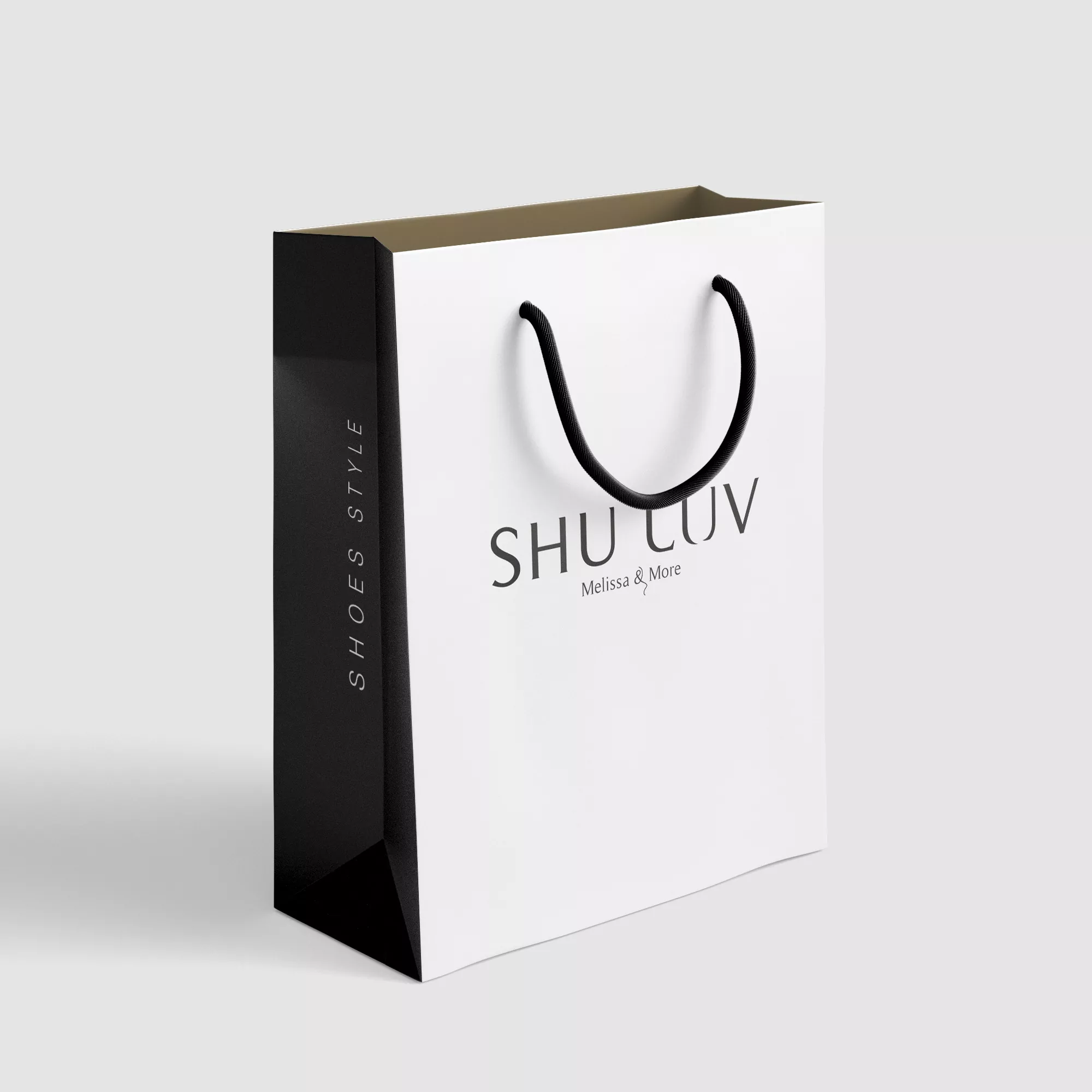 Shuluv: Melissa & More - projekt loga dla marki obuwniczej wizualizacja torby na zakupy