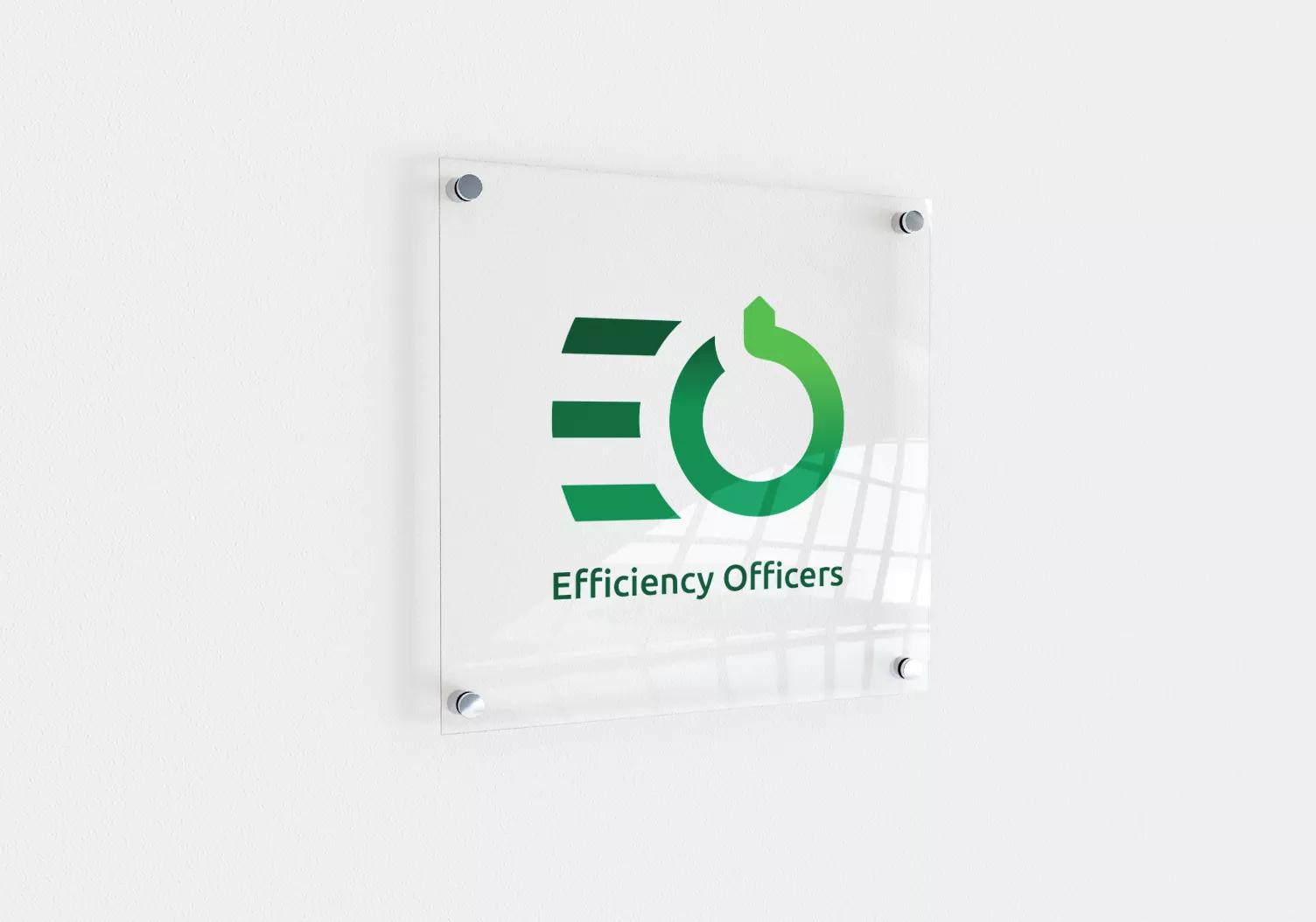 Efficiency Officers identyfikacja wizualna - projekt logo, wizualizacja na tabliczce